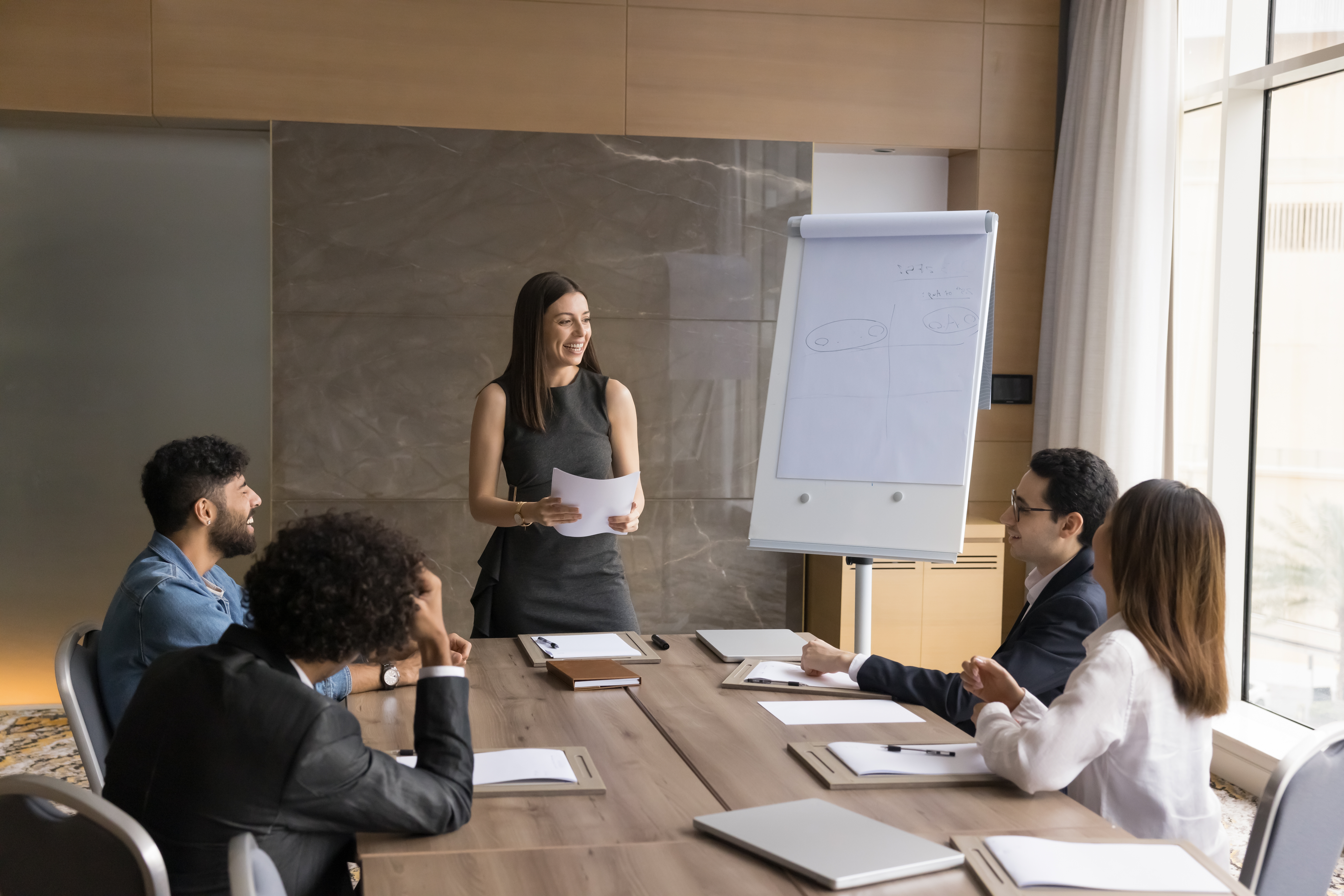 A persuasive leadership and management trainer with trainees